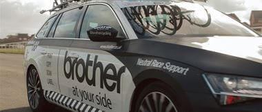 Side view of Neutral Service race support vehicle showing Brother At Your Side livery