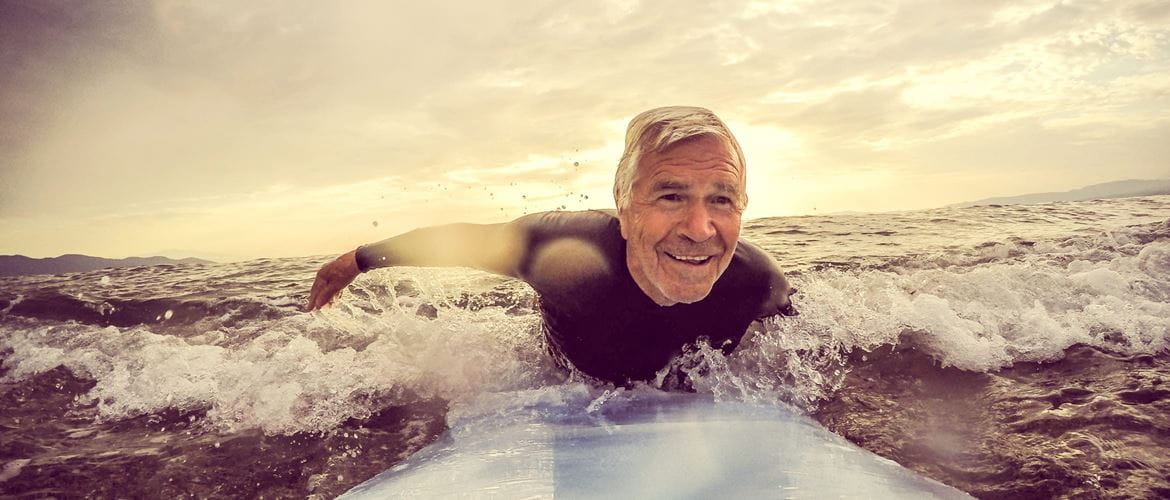 older man surfing