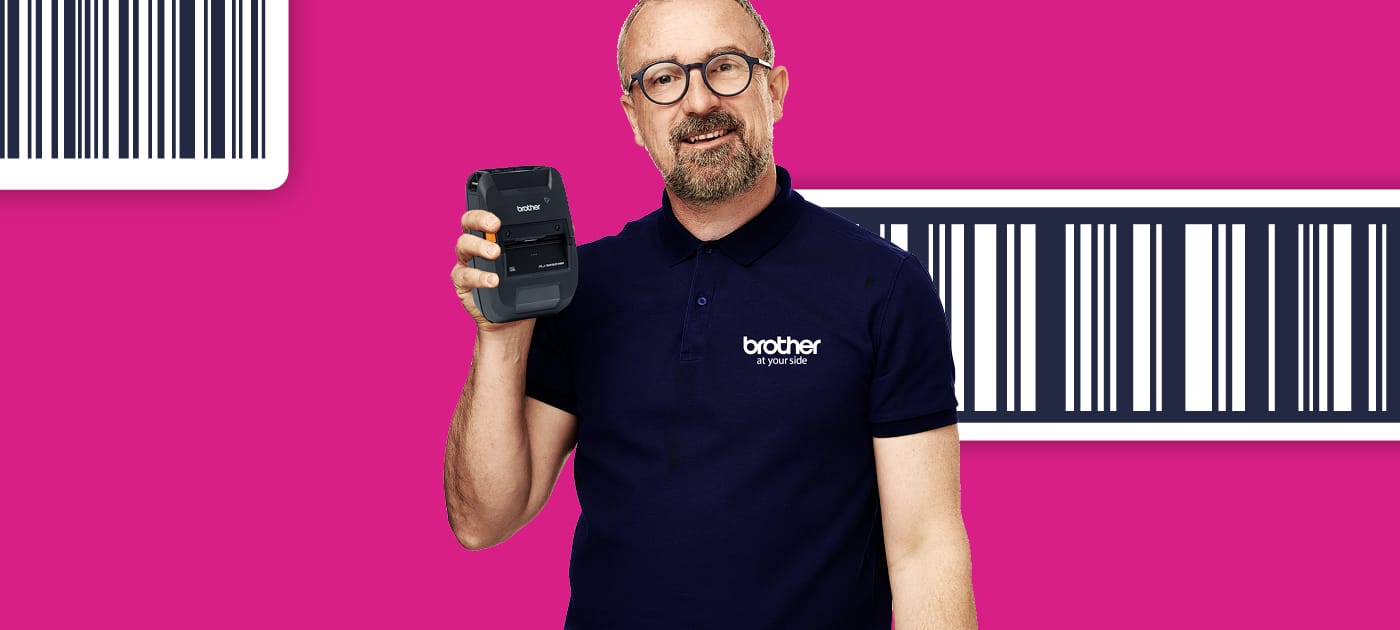A male retail worker holding a Brother mobile label and receipt printer superimposed on a barcode illustrated crimson background