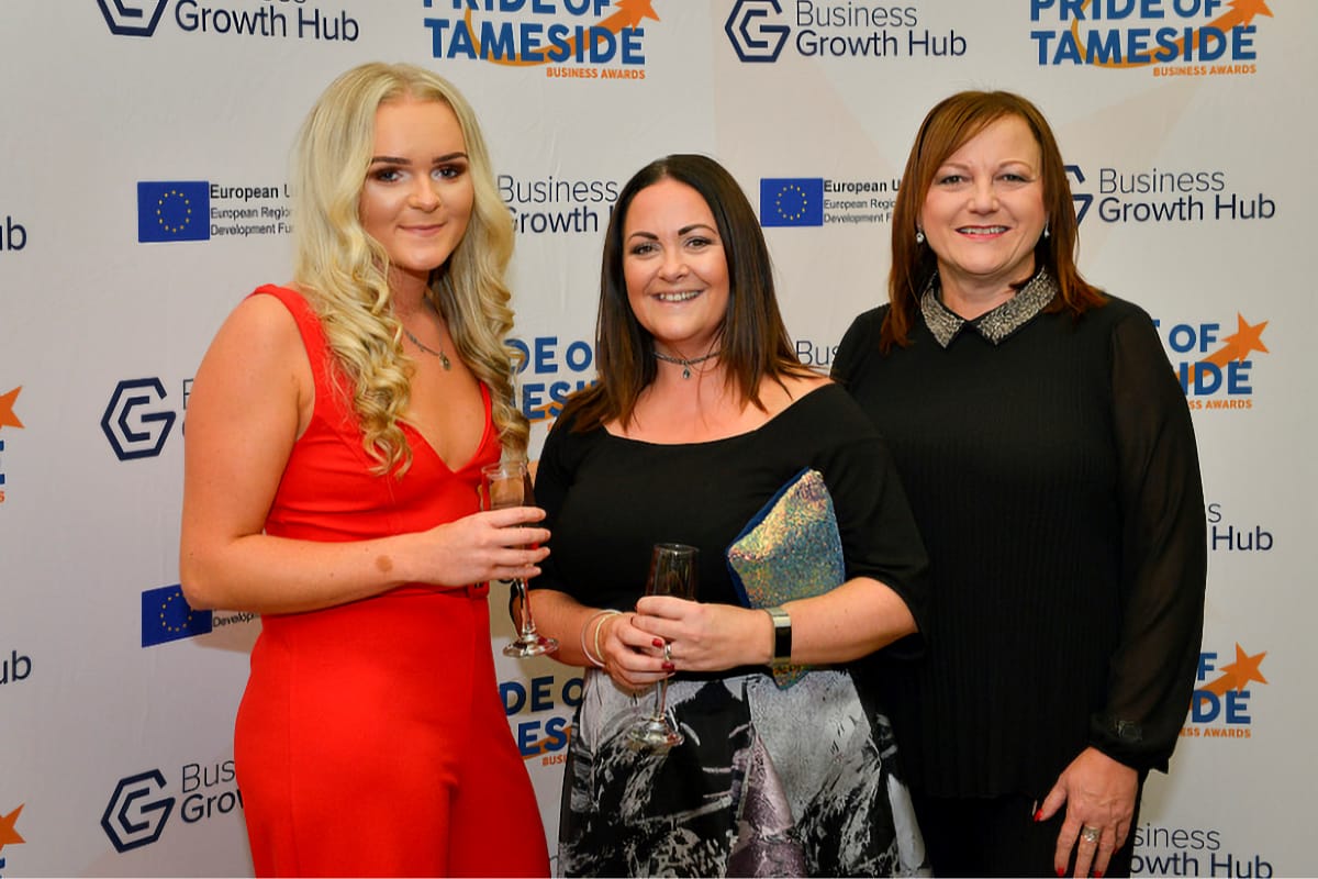 Sustainable Development Coordinator, Gemmer Crozier with two other women at a business function
