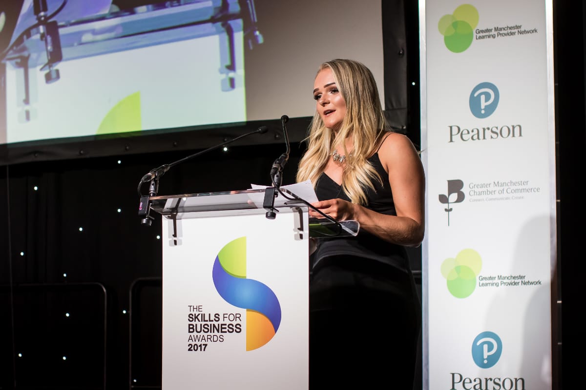 Sustainable Development Coordinator, Gemmer Crozier giving a speech at 'The skills for business awards 2017' from behind a lectern