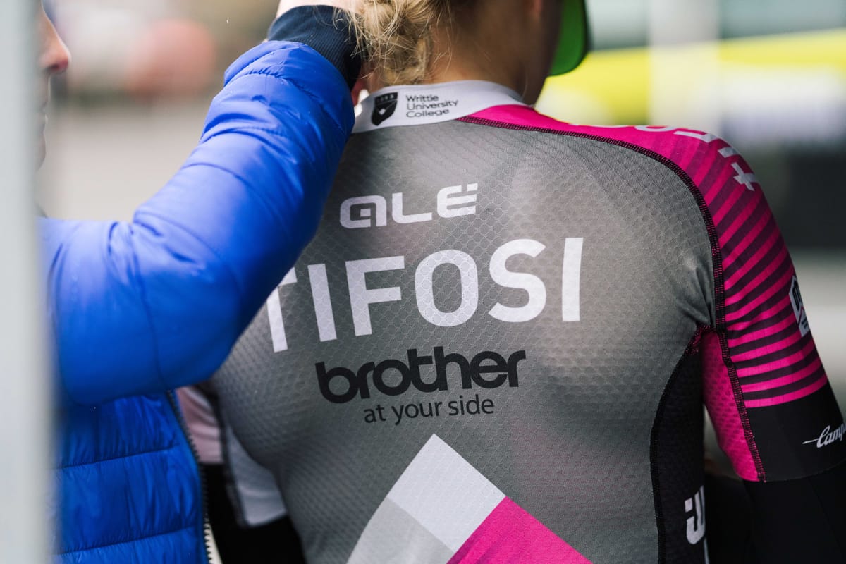 Back of a cyclist wearing a Brother UK-Tifosi p/b OnForm team jersey