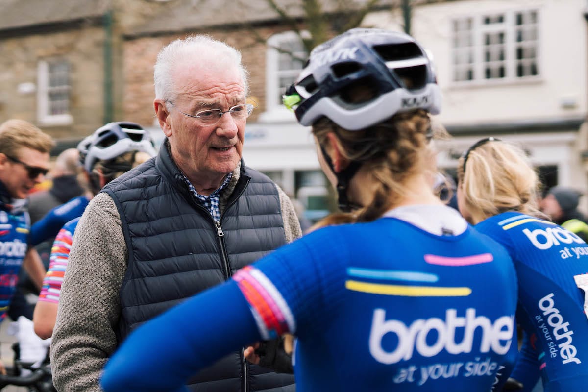 Terry Williamson in conversation with one of the cycling team