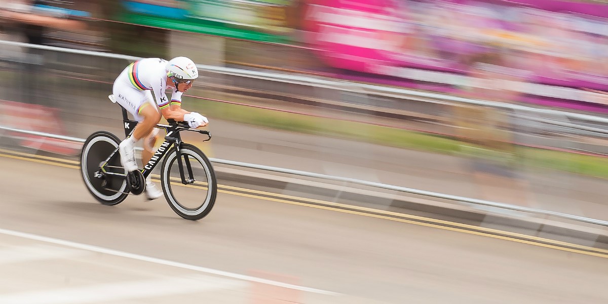 cyclist finishing a race beside the seaside