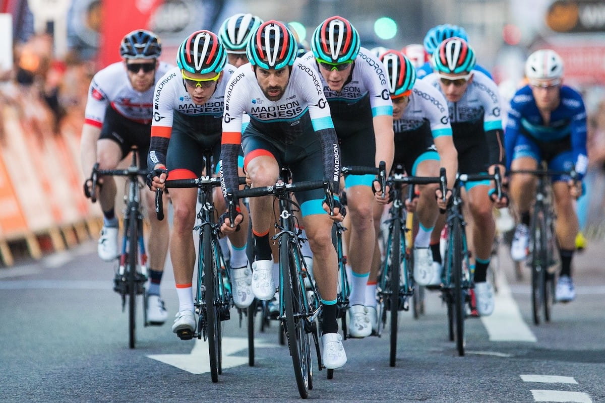 cycling team in perfect order on the front of the peloton