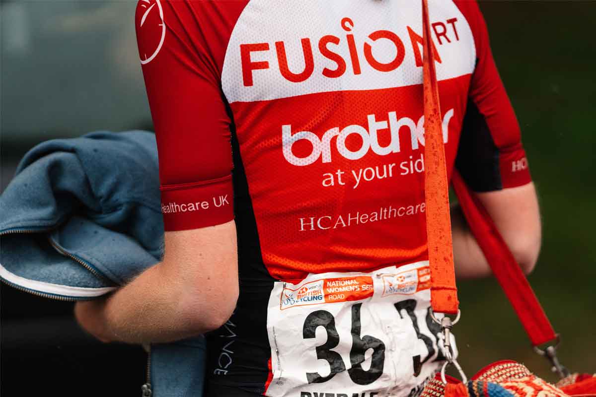 Cyclist with Fusion RT's cycling jersey with Brother logo