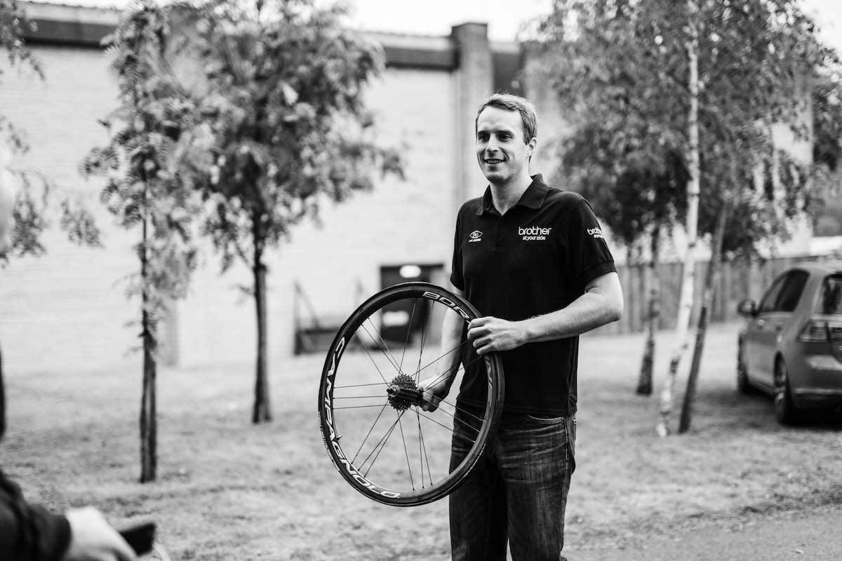 Alex Duffill with a bike tyre in his hand