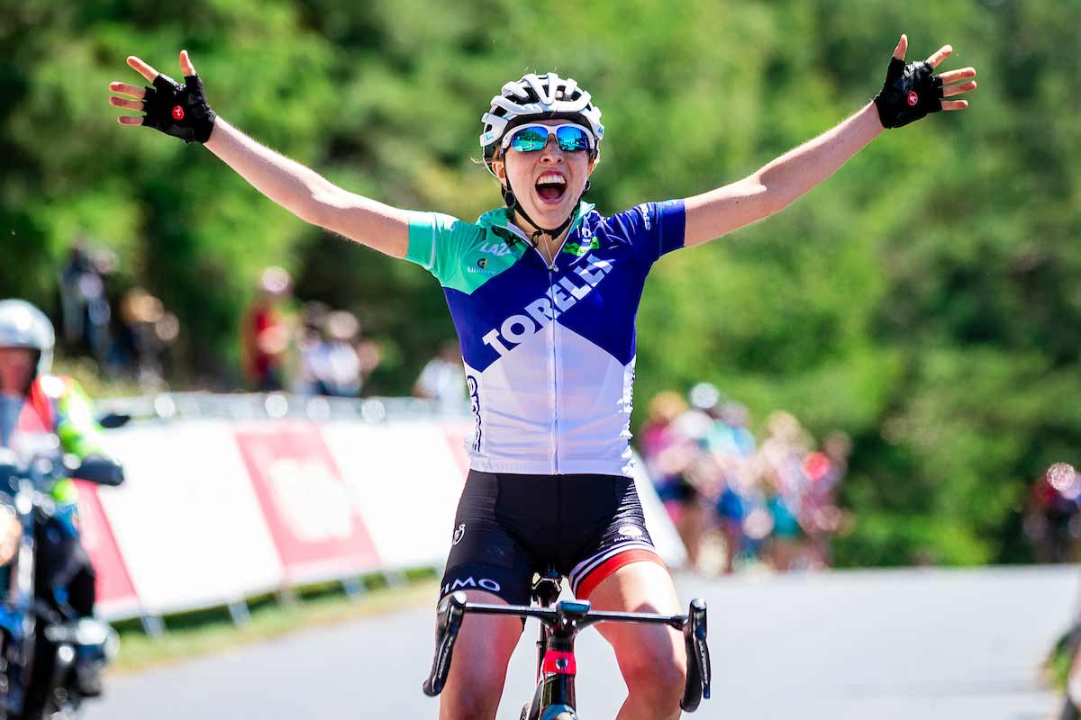 Sophie Wright celebrating a road race win