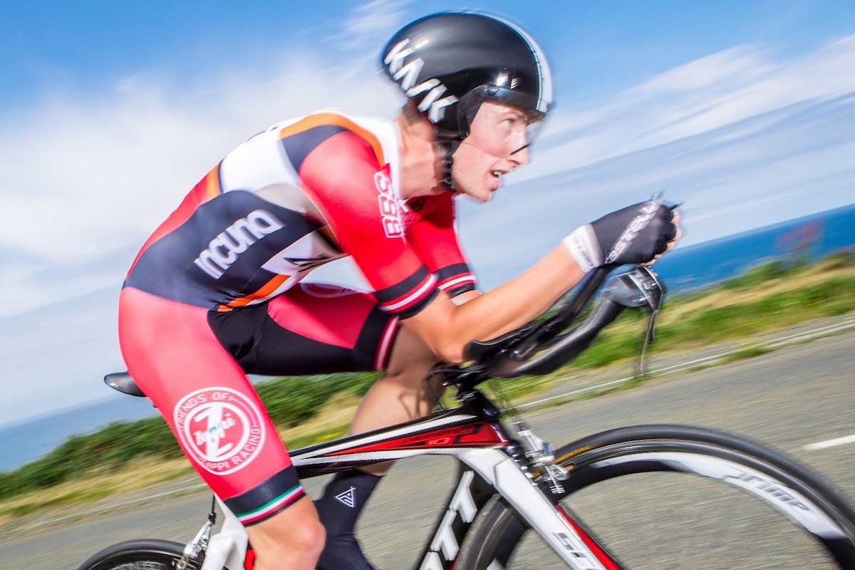 close up photo of a cyclist in the aero position
