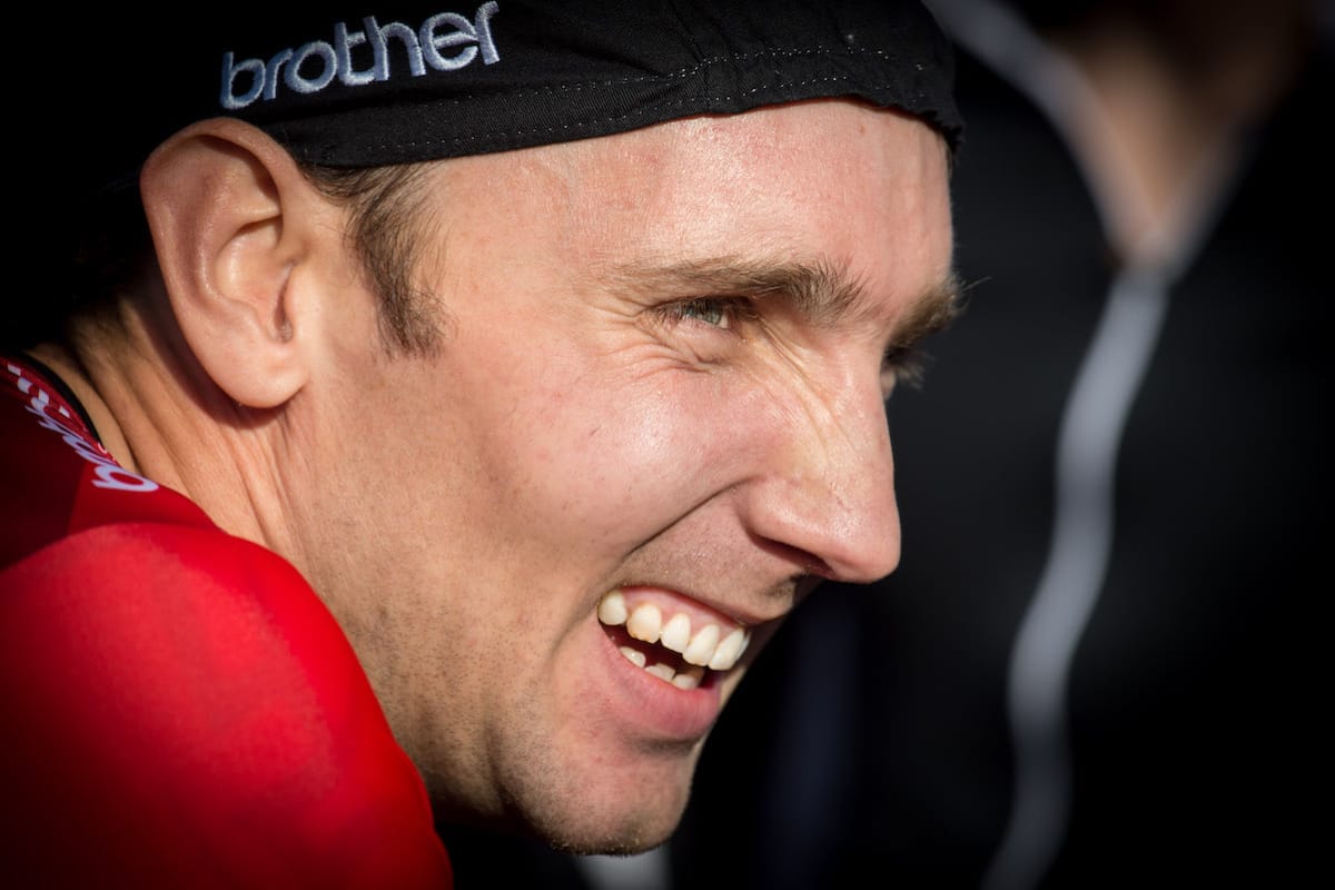 Close-up of cyclist Adam Kenway smiling