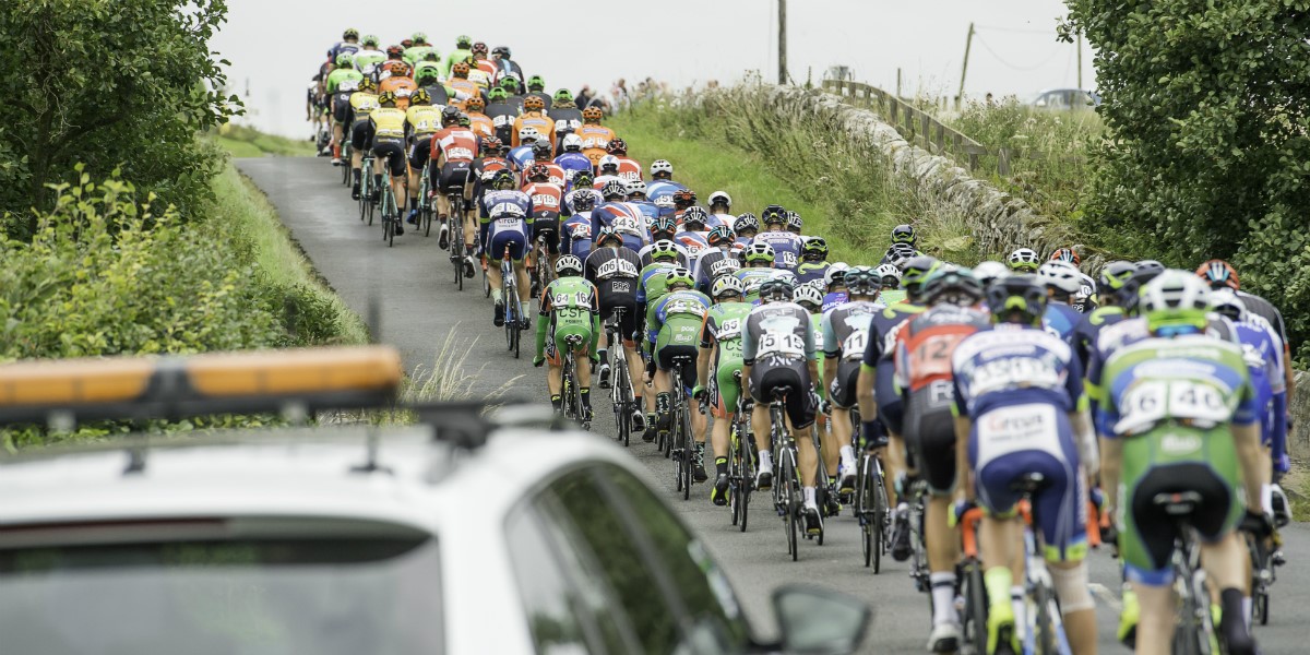 peloton stretches out as cyclists take on steady climb