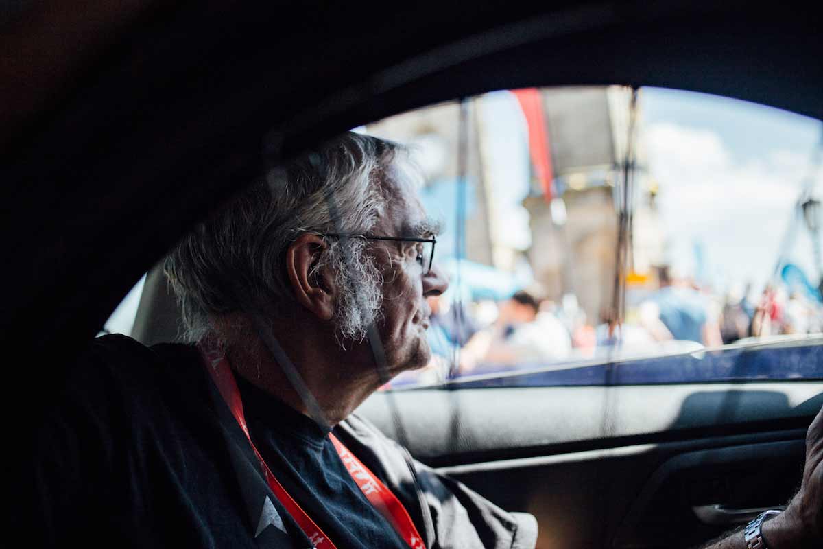 Pete Mooney sat in the back of a support car