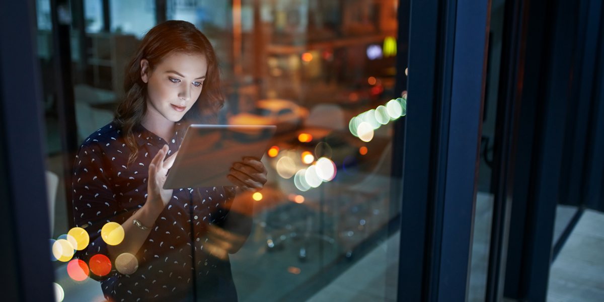 a young woman using a tablet