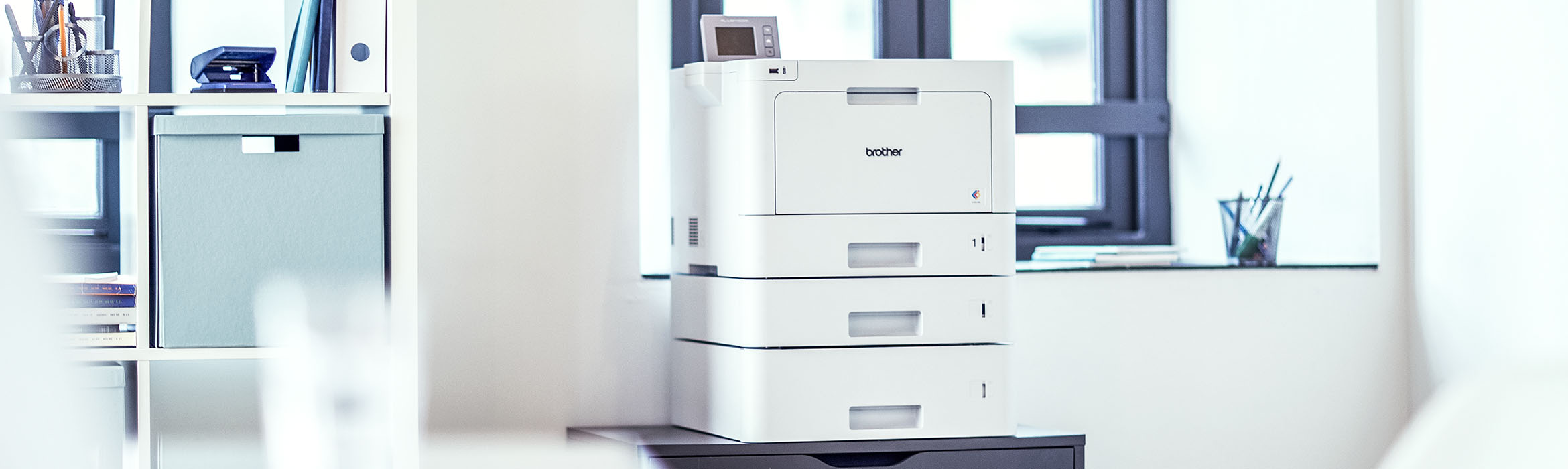 Brother managed print services printer on a desk