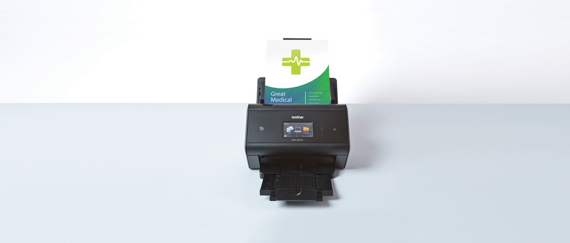 ADS Brother scanner on white background with medical document scanning