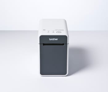 Front view of Brother TD-2120N industrial label printer on white surface and background