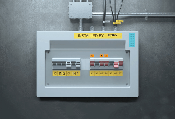 Electrical fuse box with printed labels to identify individual components