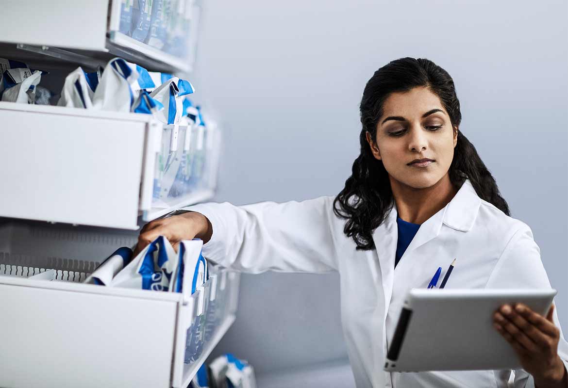 Pharmacist with an iPad