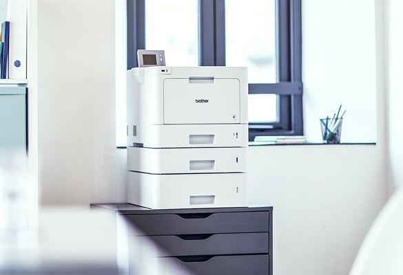 Brother printer on a desk as part of an organisation's managed print service 