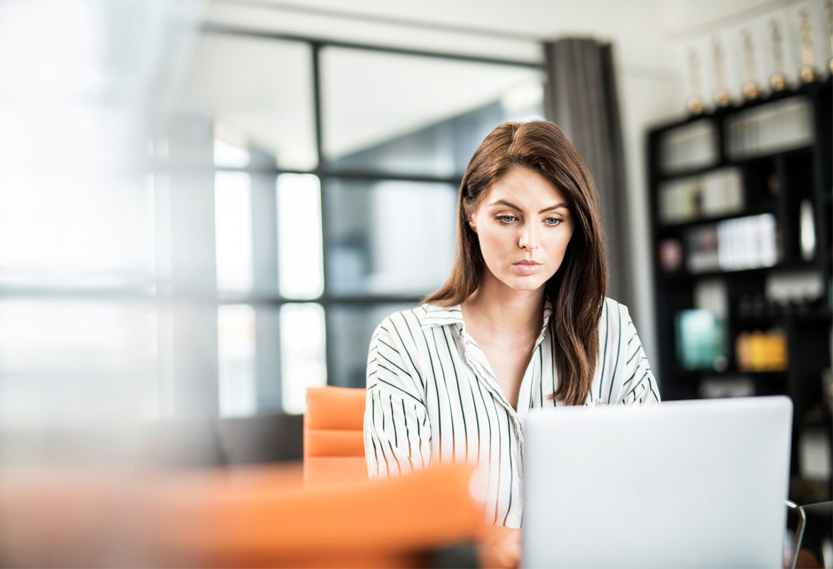 Lady working on a laptop