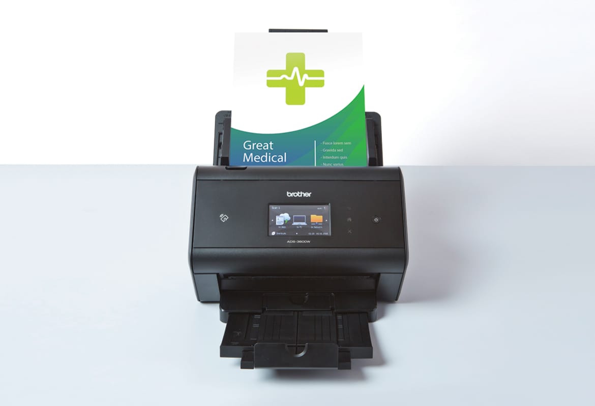ADS Brother scanner on white background with medical document scanning
