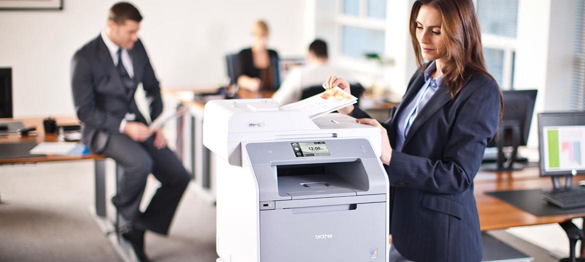 Lady using printer at her office