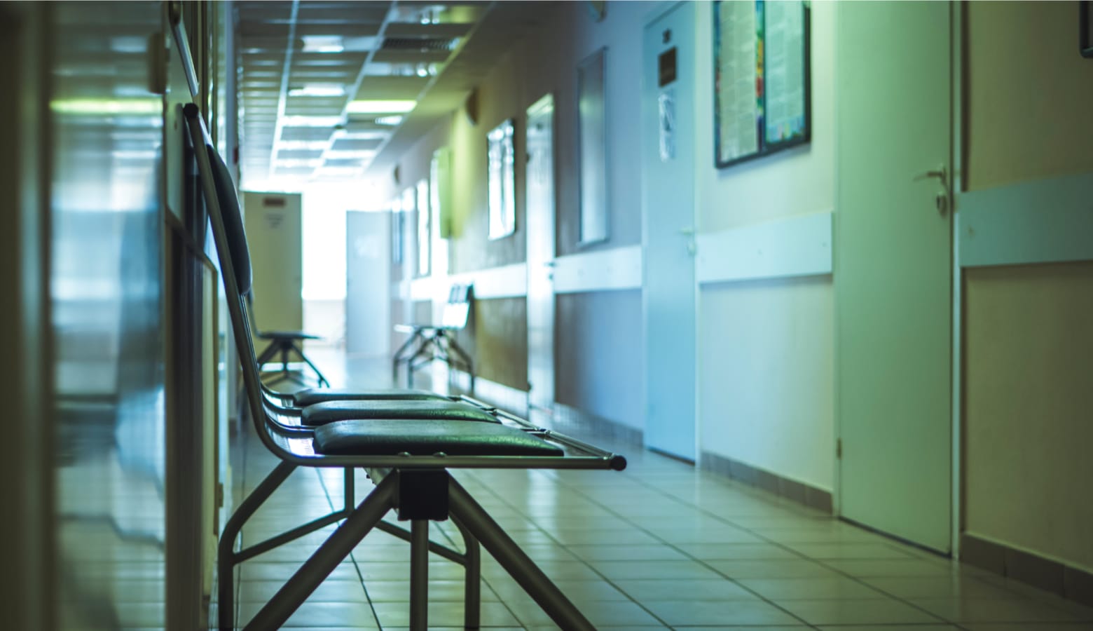 Empty chairs in a medical waiting room