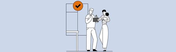 Illustration of a man and woman holding documents while standing next to a table in front of a window with a checkmark in a bubble above them
