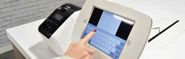 Visitor management solution with a Brother labeller and tablet