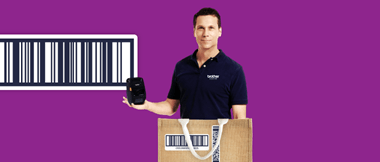 A male retail worker holding a Brother mobile label and receipt printer with a shopping bag in the foreground superimposed on a barcode illustrated purple background