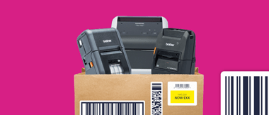 Three Brother label printers in a brown cardboard box superimposed on a barcode illustrated crimson background