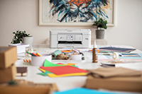 DCP-J1800DW Print & Cut with crafting resources in a home setting