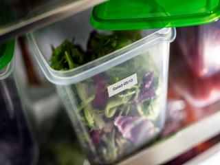 Kitchen plastic food containers labelled with a Brother P-touch label