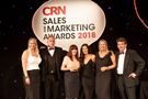 Team members receiving CRN sales and marketing award in 2018