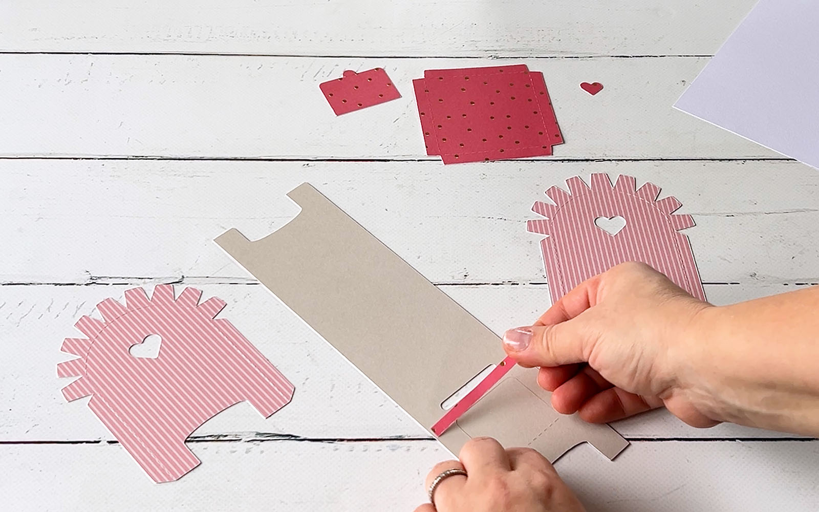 Card cutouts on wooden background