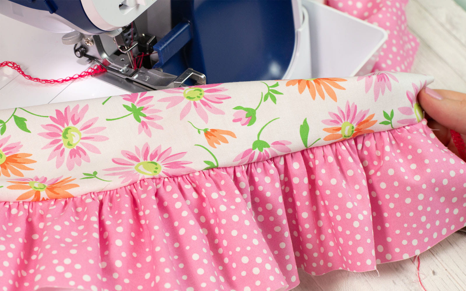 Pink fabric ruffle and floral fabric sewn together