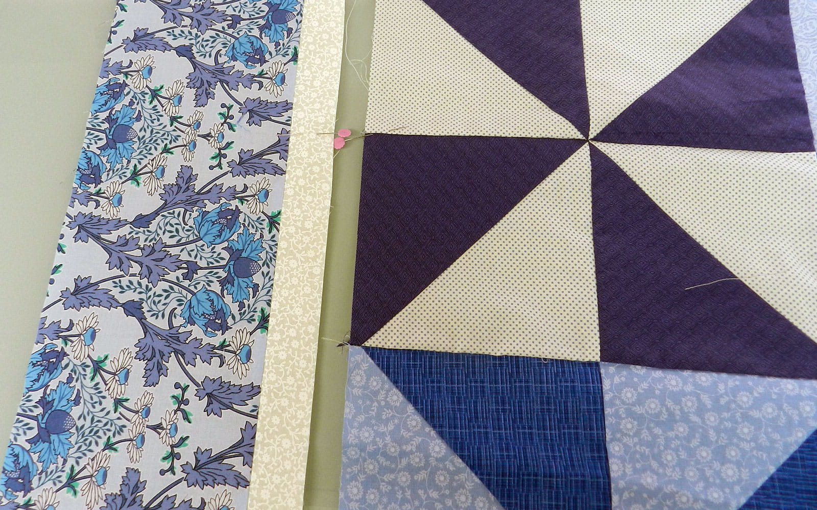 Quilt with marked fabric strip