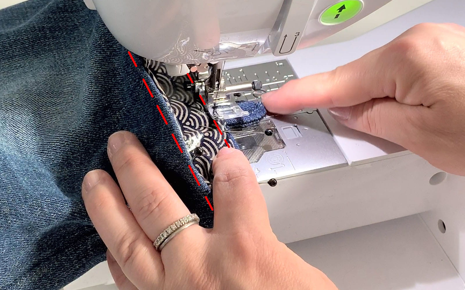 small denim bag being sewn on Brother sewing machine