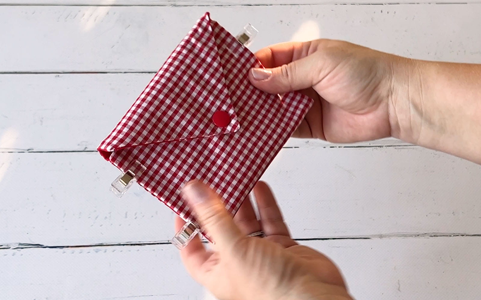 Red and white gingham fabric envelope