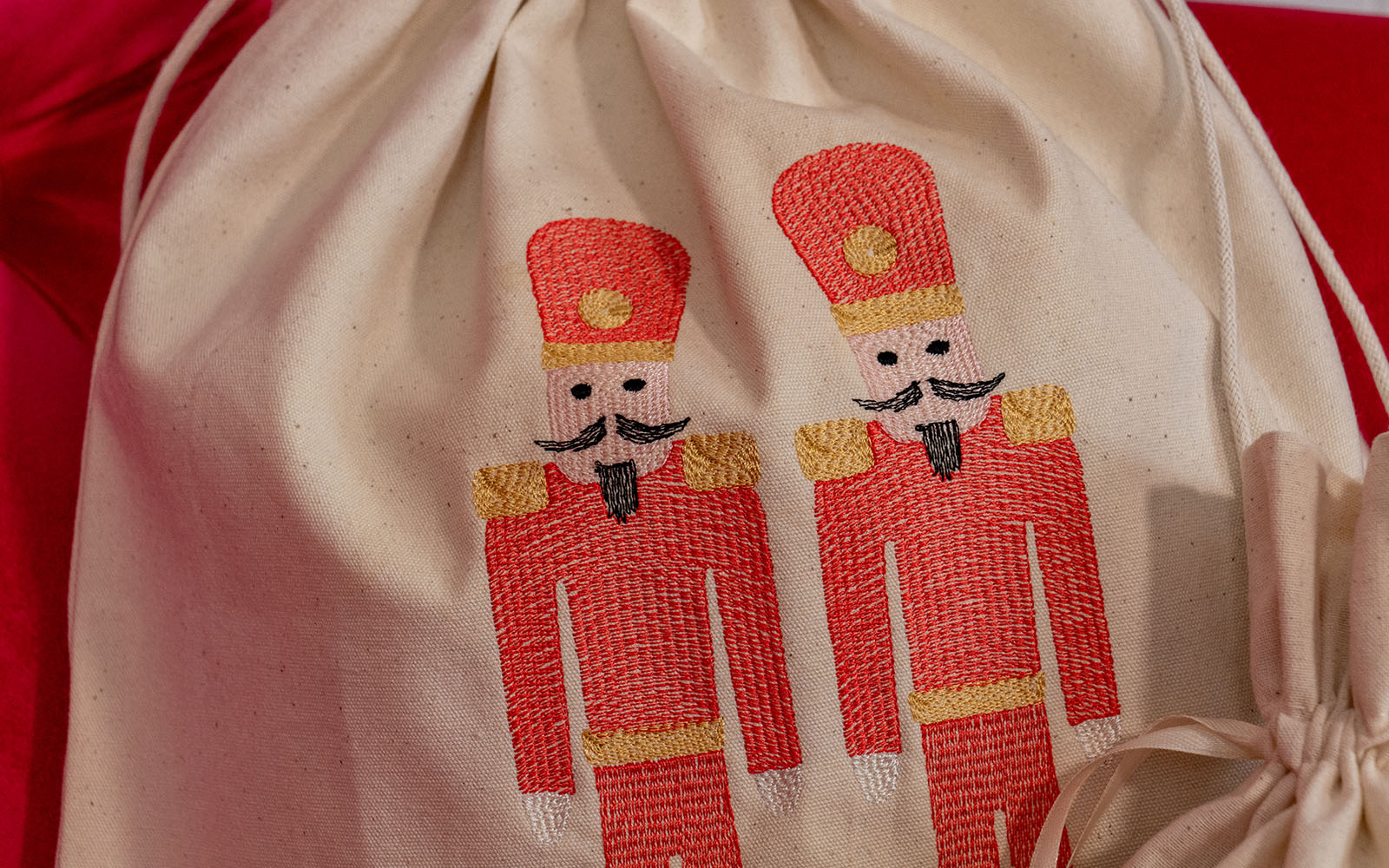 two nutcrackers embroidered on Drawstring present bags