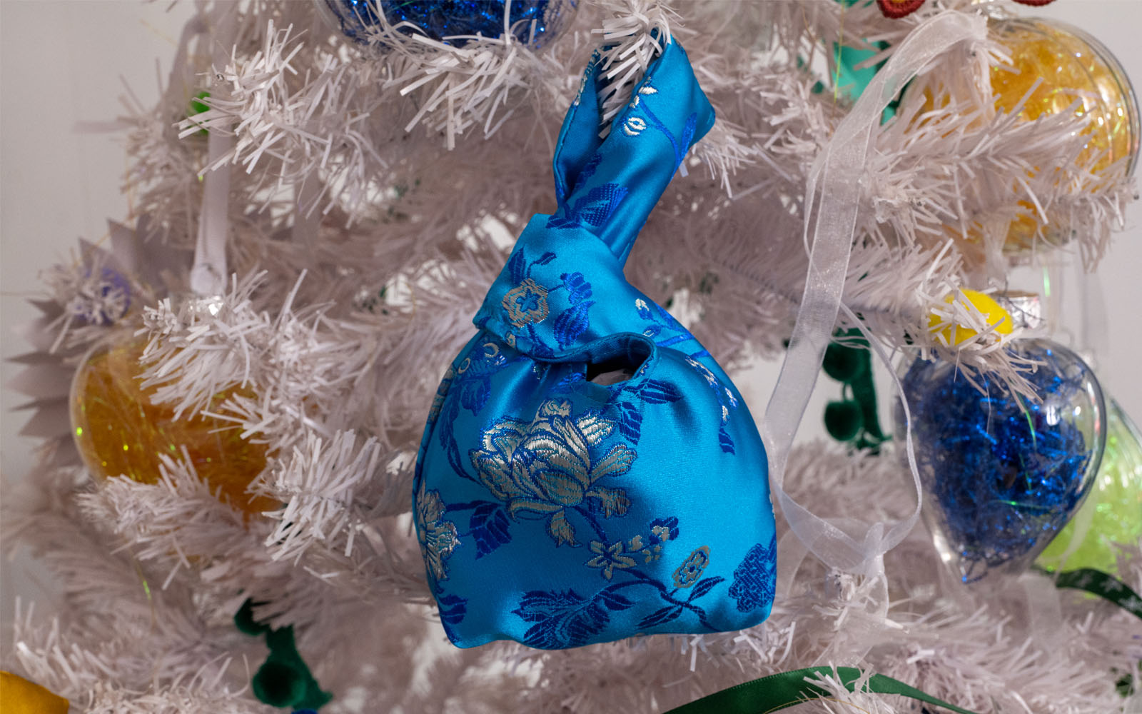 mini knot bag hanging on christmas tree