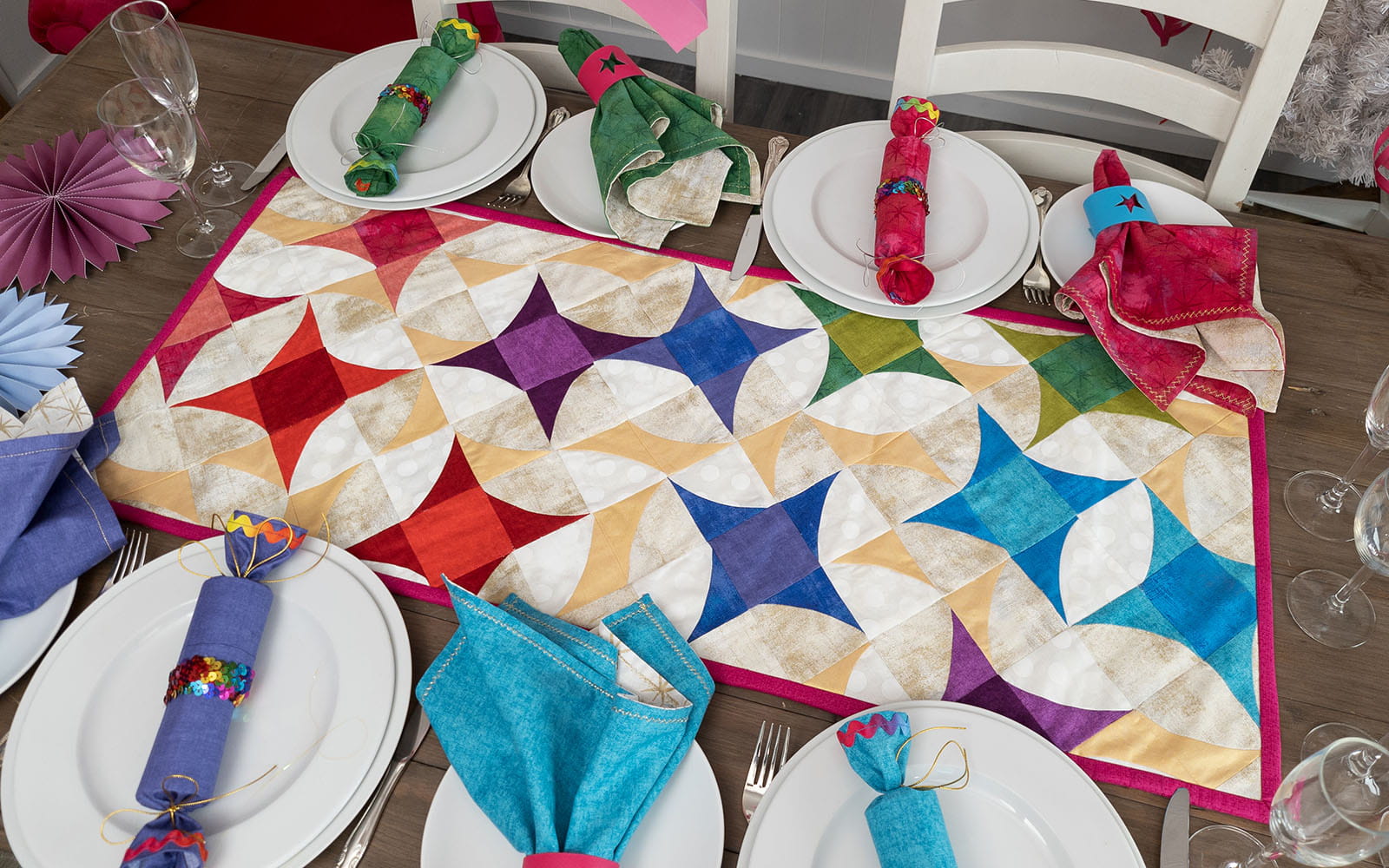 Colourful star quilt on festive set table