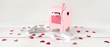 pink mini mailbox on white background