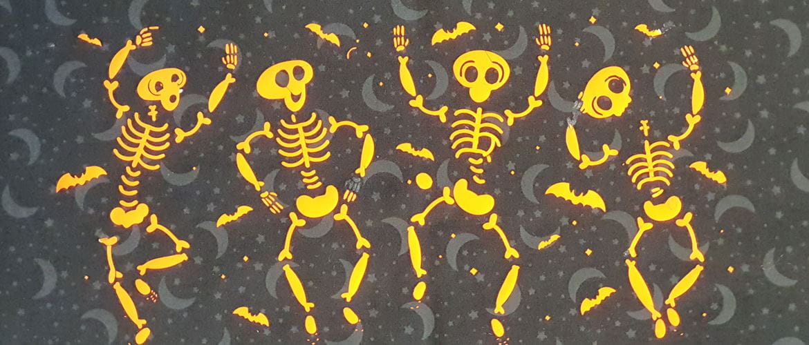 four yellow cartoon skeletons on moon background