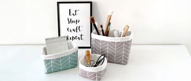 Three fabric baskets with tools