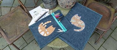 cats embroidered onto Demin book cover and pencil case