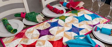 Wonky star quilt on set table