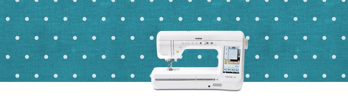 VQ2 sewing machine on teal pattern background