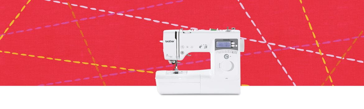 Innov-is A16 sewing machine on bright red background with stitching