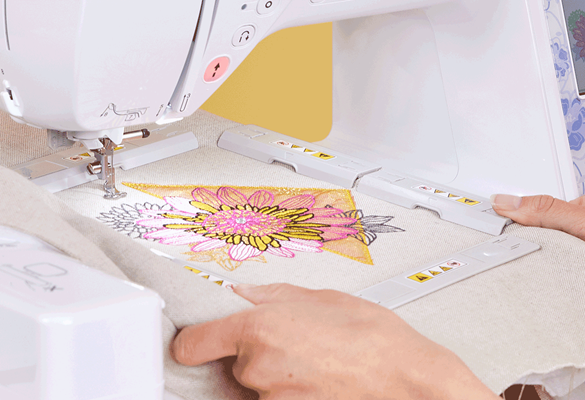 Magnet frame with flower embroidery in machine
